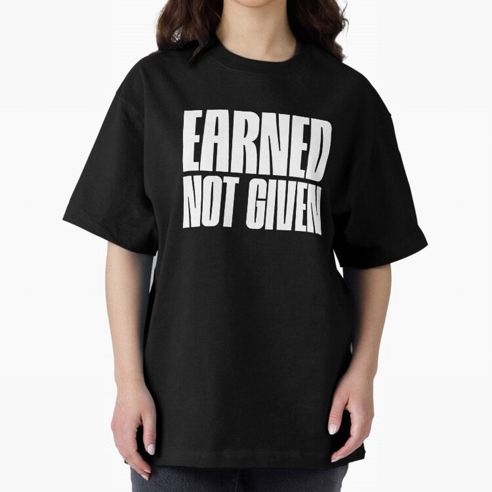 Earned not given white Oversized T-Shirt Support Iconic Players in Match Day Hype around FIFA World Cup 2026, Mbappe and Neymar, France, Goal Celebration Energy, Supporter Heritage, Football Icons and Worldwide Tournament Joy; Built for Supporters