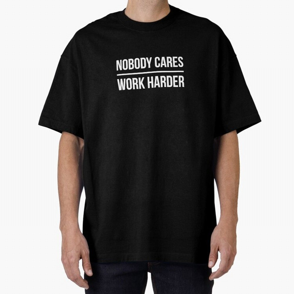 Nobody Cares Work Harder (Black Design) Oversized T-Shirt Represent Fans Who Live for FIFA World Cup 2026 Group Stage Featuring Messi, CR7 and Mbappe, Brazil Energy, Goal Celebration Energy, Supporter Heritage, Football Icons and Worldwide
