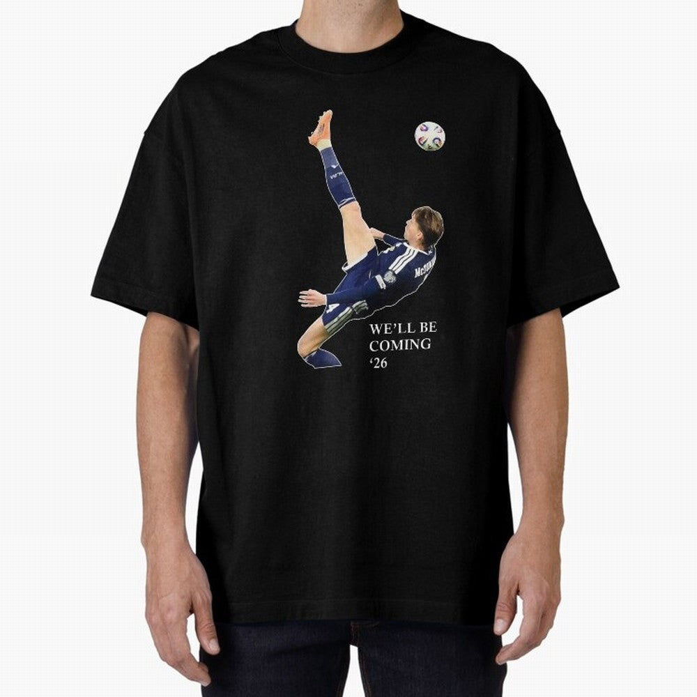 Scott McTominay We'll be coming 26 Gift For Football Lovers Classic T-Shirt Embrace FIFA World Cup 2026 Featuring Messi, CR7 and Mbappe, England and Germany Energy, Championship Spirit, Famous Goals, Roaring Crowds and International Football Unity;